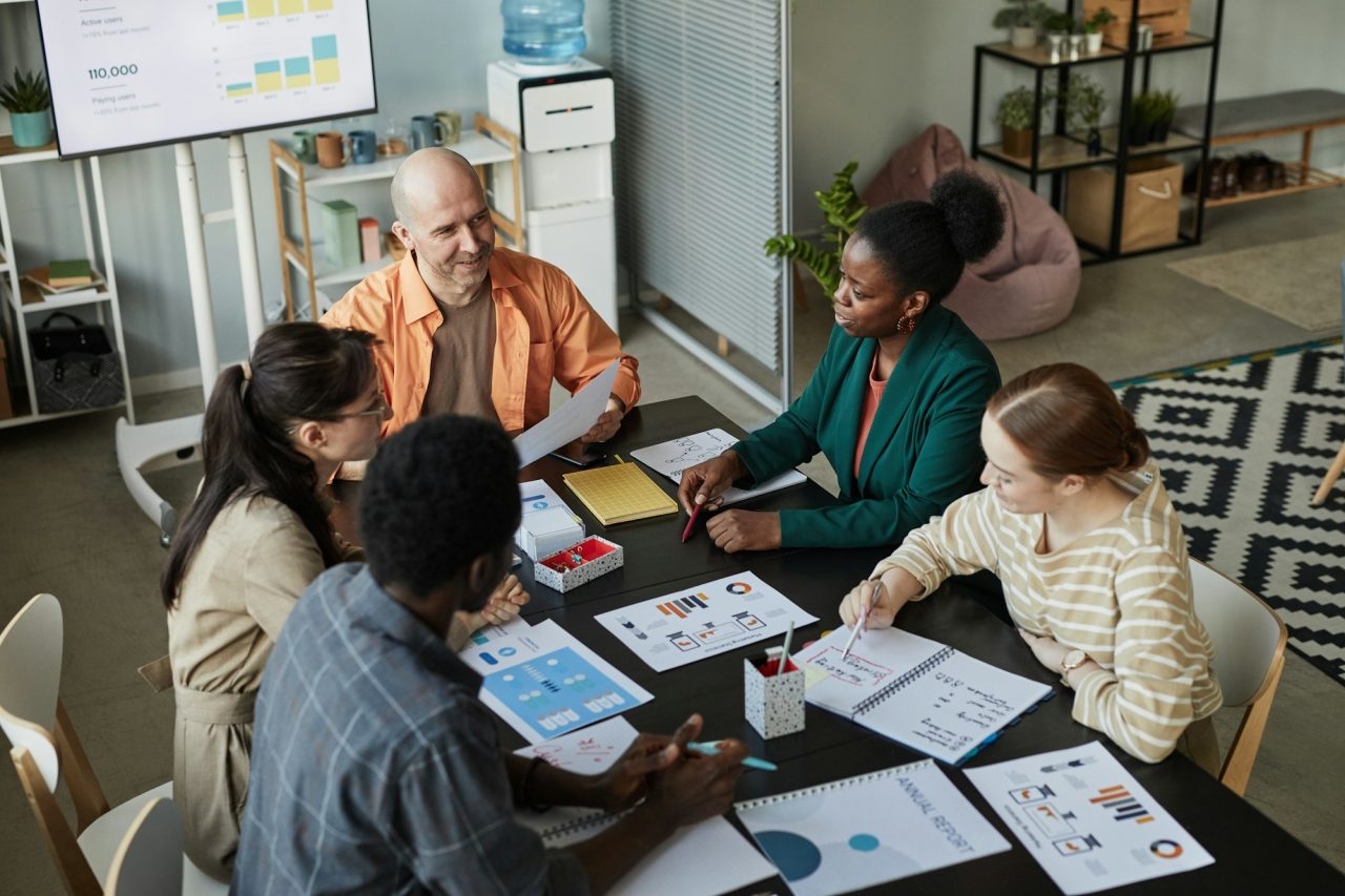 diverse-business-team-meeting-at-table.jpg